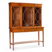 A FINE EDWARDIAN SATINWOOD BREAKFRONT BOOKCASE CABINET STAMPED EDWARDS & ROBERTS