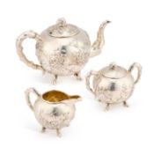 A CHINESE SILVER THREE-PIECE TEA SERVICE