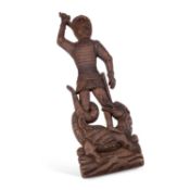 A 19TH CENTURY PINE CARVING OF SAINT GEORGE AND THE DRAGON