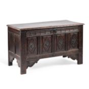 A CARVED OAK COFFER 17TH CENTURY AND LATER