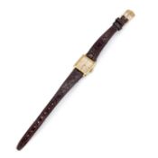 A LADY'S GOLD PLATED OMEGA STRAP WATCH