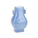 A CHINESE MONOCHROME-GLAZED PORCELAIN VASE