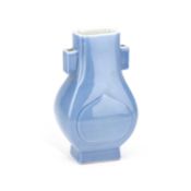 A CHINESE MONOCHROME-GLAZED PORCELAIN VASE