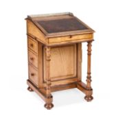 A VICTORIAN ASH DAVENPORT STAMPED GILLOW