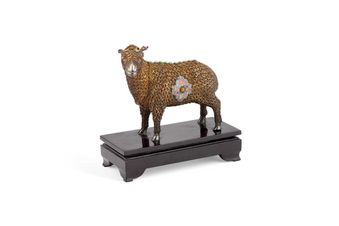 A CHINESE SILVER-GILT, FILIGREE AND ENAMEL MODEL OF A SHEEP - Image 1 of 2