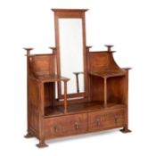 A LARGE ARTS AND CRAFTS OAK DRESSING CHEST IN THE MANNER OF A.H. MACKMURDO