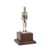 AN ELIZABETH II SILVER STATUE OF A SOLDIER