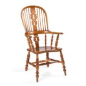 A 19TH CENTURY ELM AND OAK WINDSOR ARMCHAIR OF NOTTINGHAMSHIRE ORIGIN