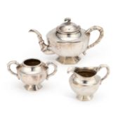 A CHINESE SILVER THREE-PIECE TEA SERVICE