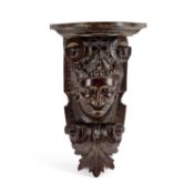 A 19TH CENTURY CARVED PINE WALL BRACKET