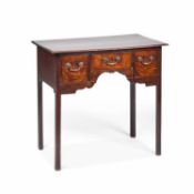 A GEORGE III OAK LOWBOY