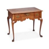 A GEORGE III OAK LOWBOY