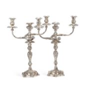 A PAIR OF GEORGE III SILVER CANDELABRA IN THE ROCOCO STYLE