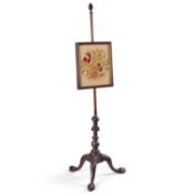 A 19TH CENTURY MAHOGANY POLESCREEN IN IRISH CHIPPENDALE STYLE