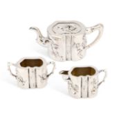 A CHINESE SILVER THREE-PIECE TEA SERVICE