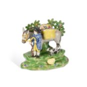 A STAFFORDSHIRE GROUP OF THE JOLLY TRAVELLER CIRCA 1820