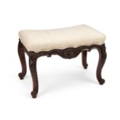 AN IRISH CHIPPENDALE STYLE CARVED MAHOGANY STOOL