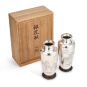 A FINE PAIR OF JAPANESE SILVER VASES