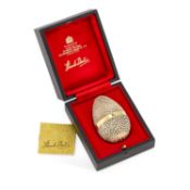 STUART DEVLIN (1931-2018) AN ELIZABETH II SILVER-GILT SURPRISE EGG