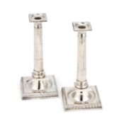 A LARGE PAIR OF SILVER COLUMNAR CANDLESTICKS
