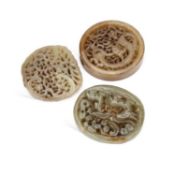 THREE CHINESE JADE PIERCED PLAQUES