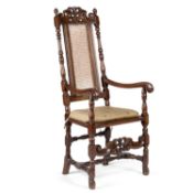 A CAROLEAN STYLE WALNUT AND CANEWORK HIGH-BACK OPEN ARMCHAIR