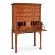 AN INLAID CAMPHOR SECRETAIRE CHEST ON STAND