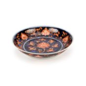 A CHINESE BLUE AND IRON-RED PORCELAIN DISH