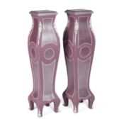 A PAIR OF DECORATIVE PAINTED PEDESTALS