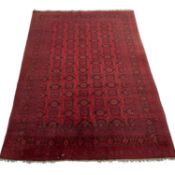 AN AFGHAN CARPET