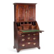 AN 18TH CENTURY OAK BUREAU BOOKCASE