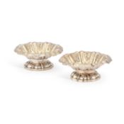 A PAIR OF WILLIAM IV SILVER-GILT SALTS