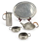 A LIBERTY & CO TUDRIC PEWTER FOUR-PIECE TEA SERVICE