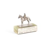 AN ELIZABETH II CAST SILVER HORSE TROPHY