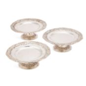 REGIMENTAL INTEREST: A SET OF THREE VICTORIAN SILVER TAZZAS