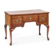 A GEORGE II WALNUT SIDE TABLE