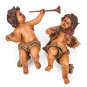 A PAIR OF PAINTED HANGING MODELS OF MUSICAL PUTTI 20TH CENTURY