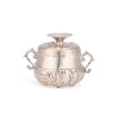 AN EARLY CHARLES II SILVER COVERED TWIN-HANDLED PORRINGER