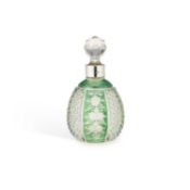 AN EDWARDIAN SILVER-COLLARED CUT-GLASS SCENT BOTTLE