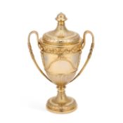 A NEOCLASSICAL REVIVAL SILVER-GILT TROPHY CUP AND COVER