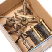 A GROUP OF VICTORIAN AND LATER BRASS AND CAST IRON ANDIRONS