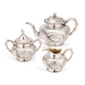 A CHINESE SILVER THREE-PIECE TEA SERVICE