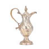 AN EARLY GEORGE III SILVER EWER