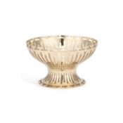 AN EDWARDIAN SILVER-GILT BOWL