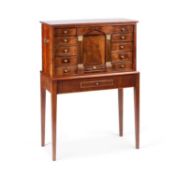 A LATE 19TH CENTURY CONTINENTAL STRING-INLAID MAHOGANY CABINET ON STAND