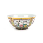 A CHINESE PORCELAIN BOWL WITH A YELLOW GROUND