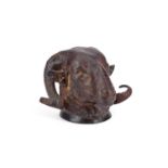A BRONZE RAM'S HEAD