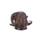 A BRONZE RAM'S HEAD