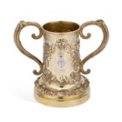 A VICTORIAN SILVER-GILT TWO-HANDLED CUP OR BOTTLE HOLDER