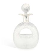 AN EDWARDIAN SILVER-MOUNTED GLASS DECANTER
